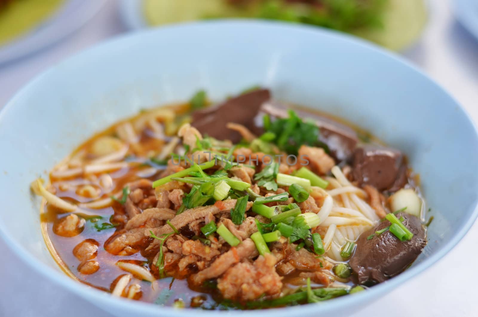  rice noodles with spicy pork sauce , Thai cuisine