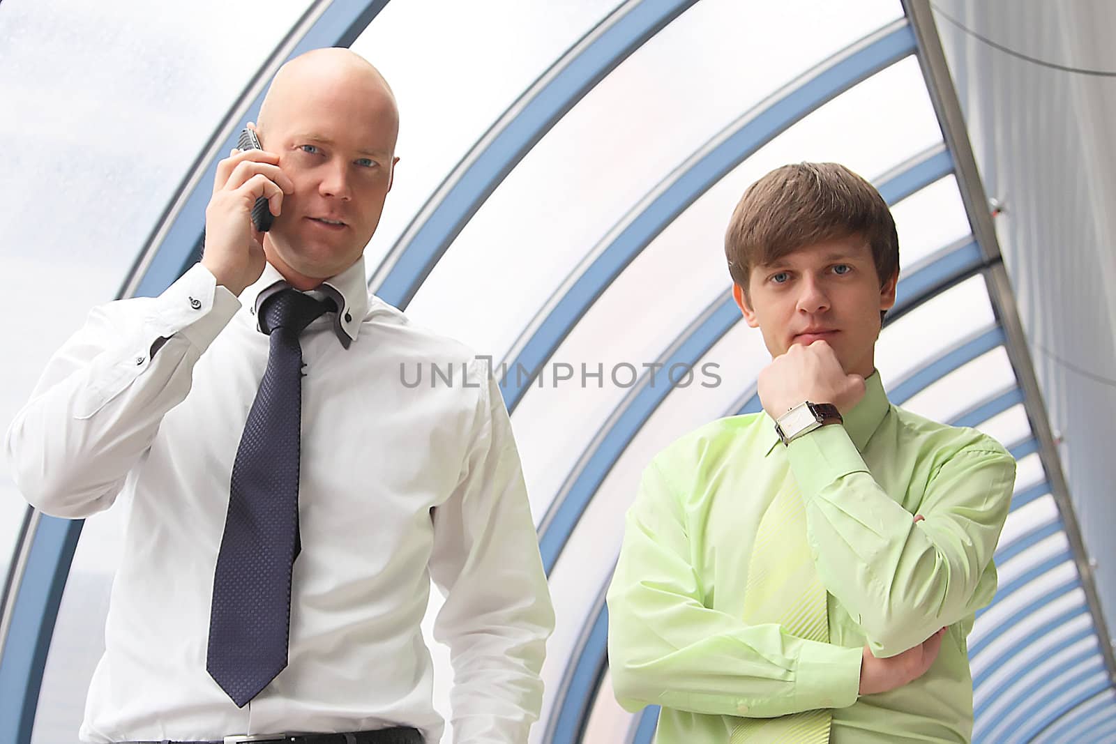 Portrait of two young and successful businessmen