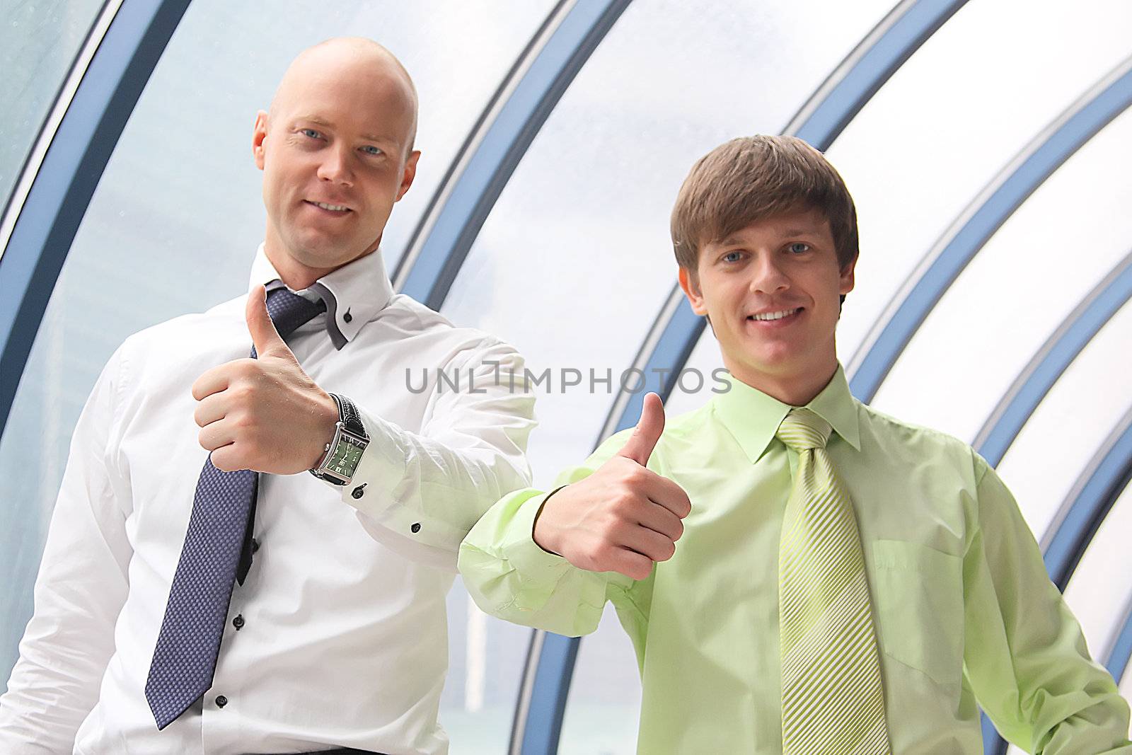 Portrait of two young and successful businessmen