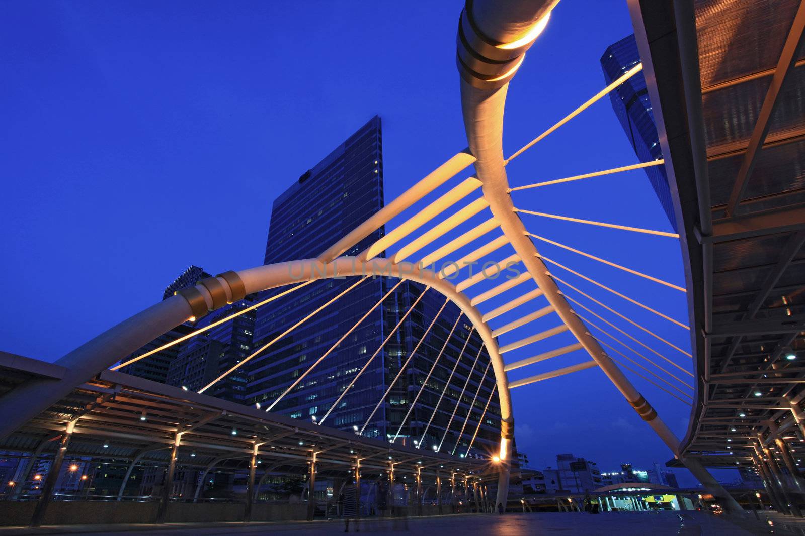 pubic skywalk at bangkok downtown square night in business zone 