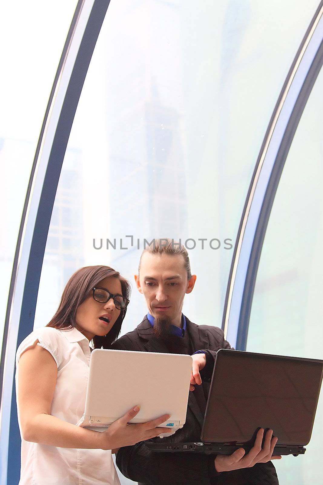 Business man and the woman discuss the project