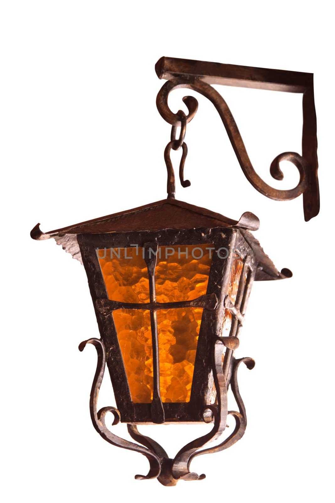 old wrought-iron lamp on a white background