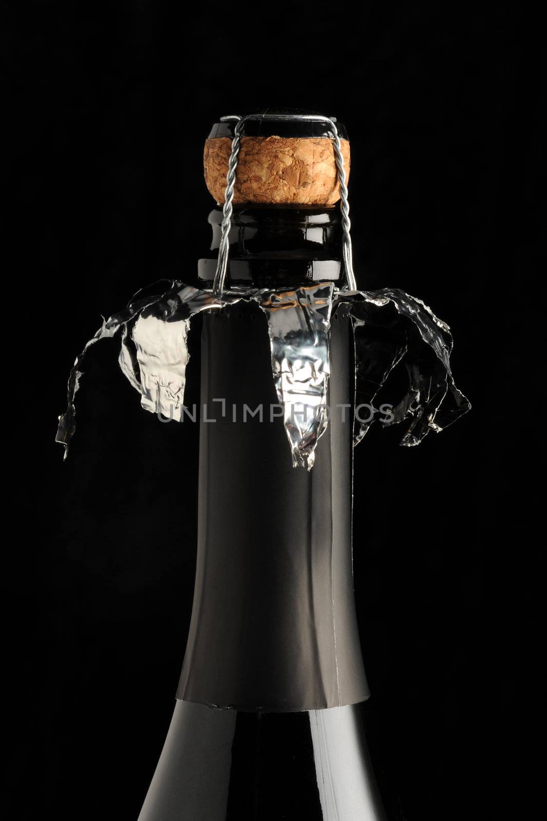 sparkling wine cap on black background