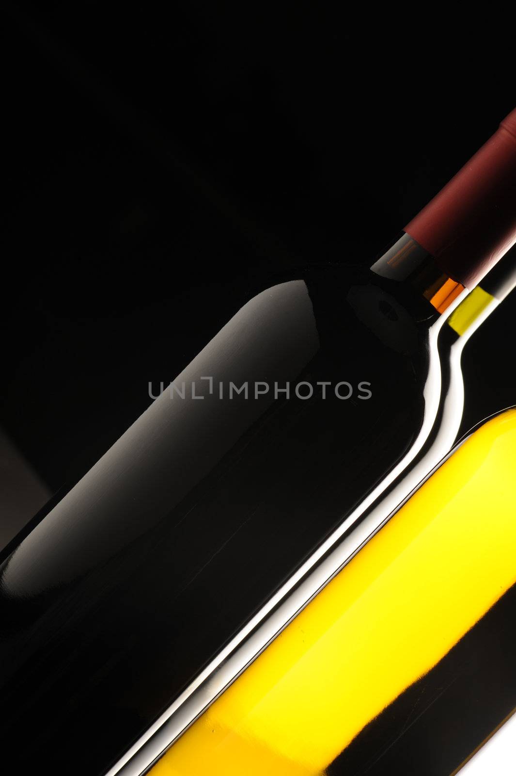 bottles of red and white wine, geometric composition