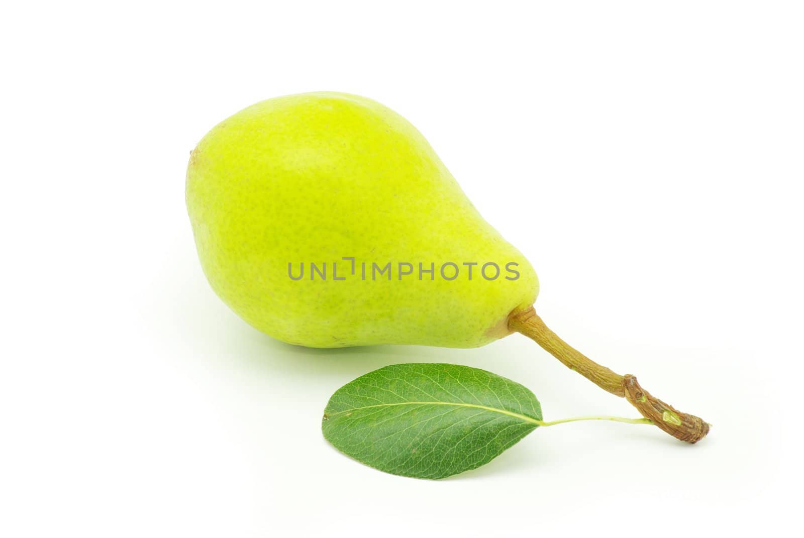 ripe fresh green pear with leaf isolated on white