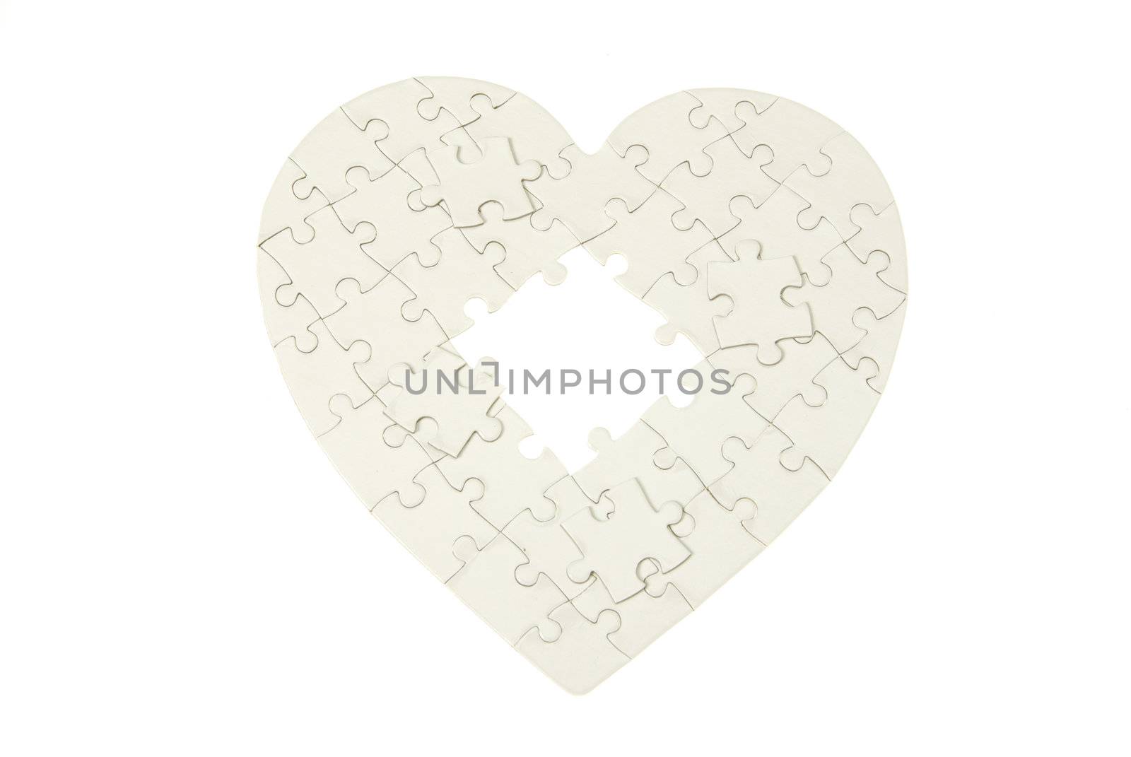 heart made from the puzzle on white