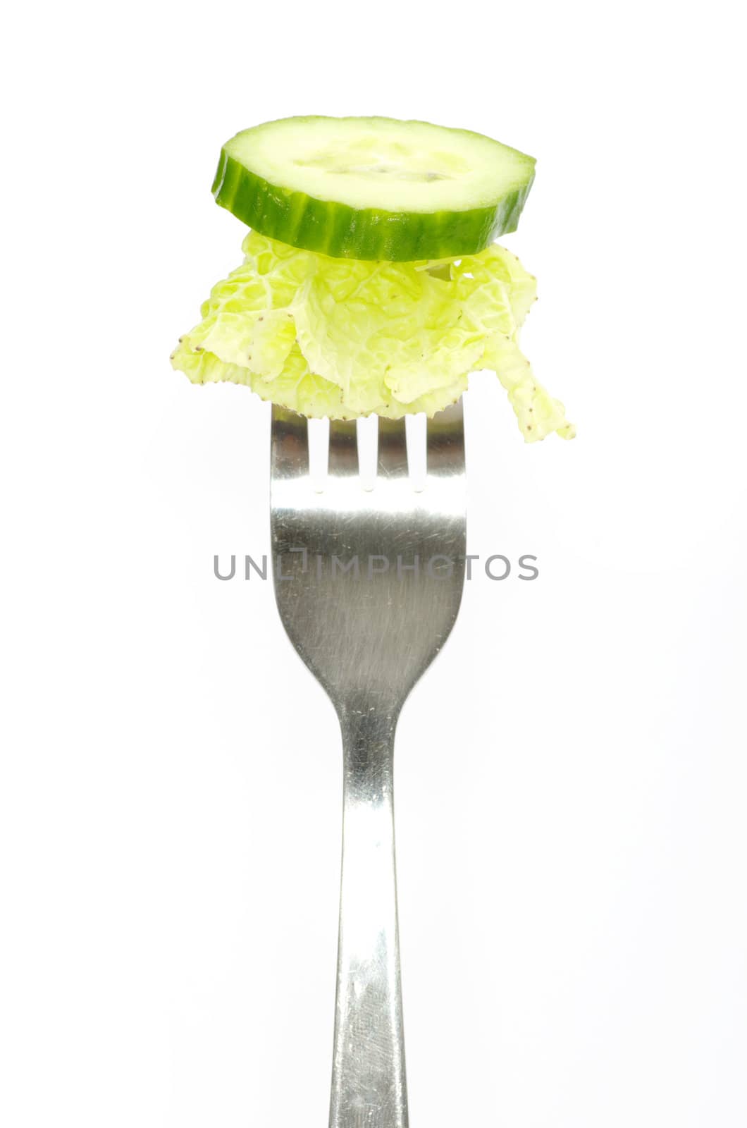 fresh cucumber on a fork
