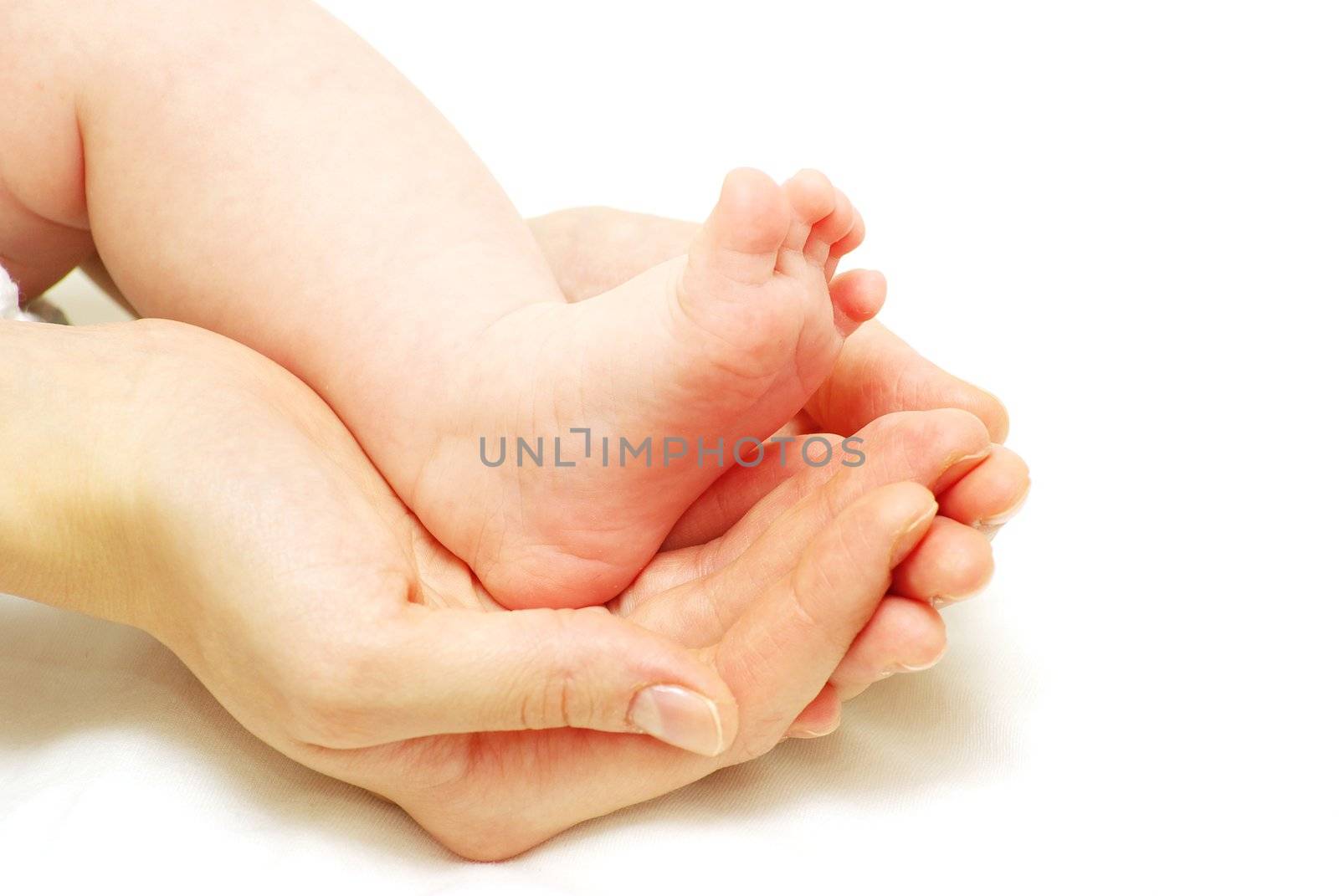 newborn baby feet isolated on white