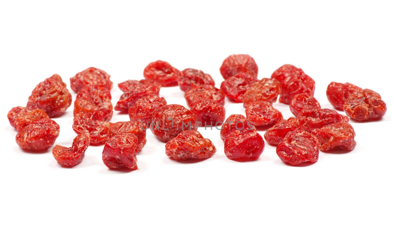 red dried goji berries on white