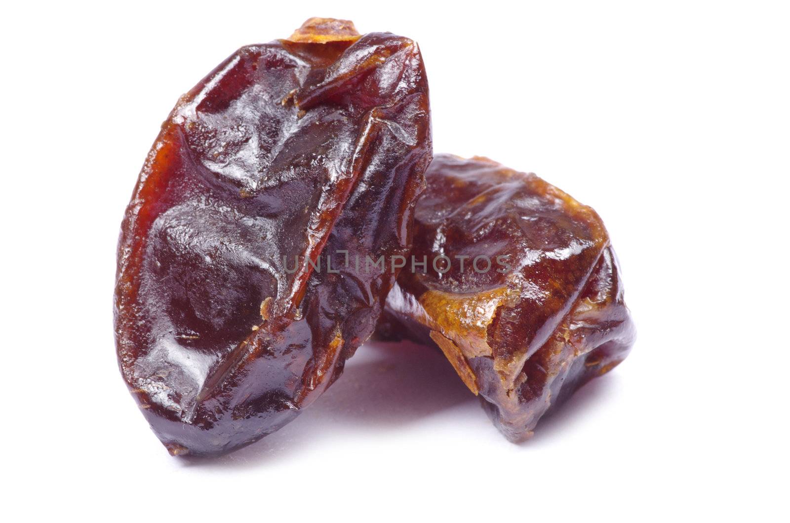 dryed dates on white background