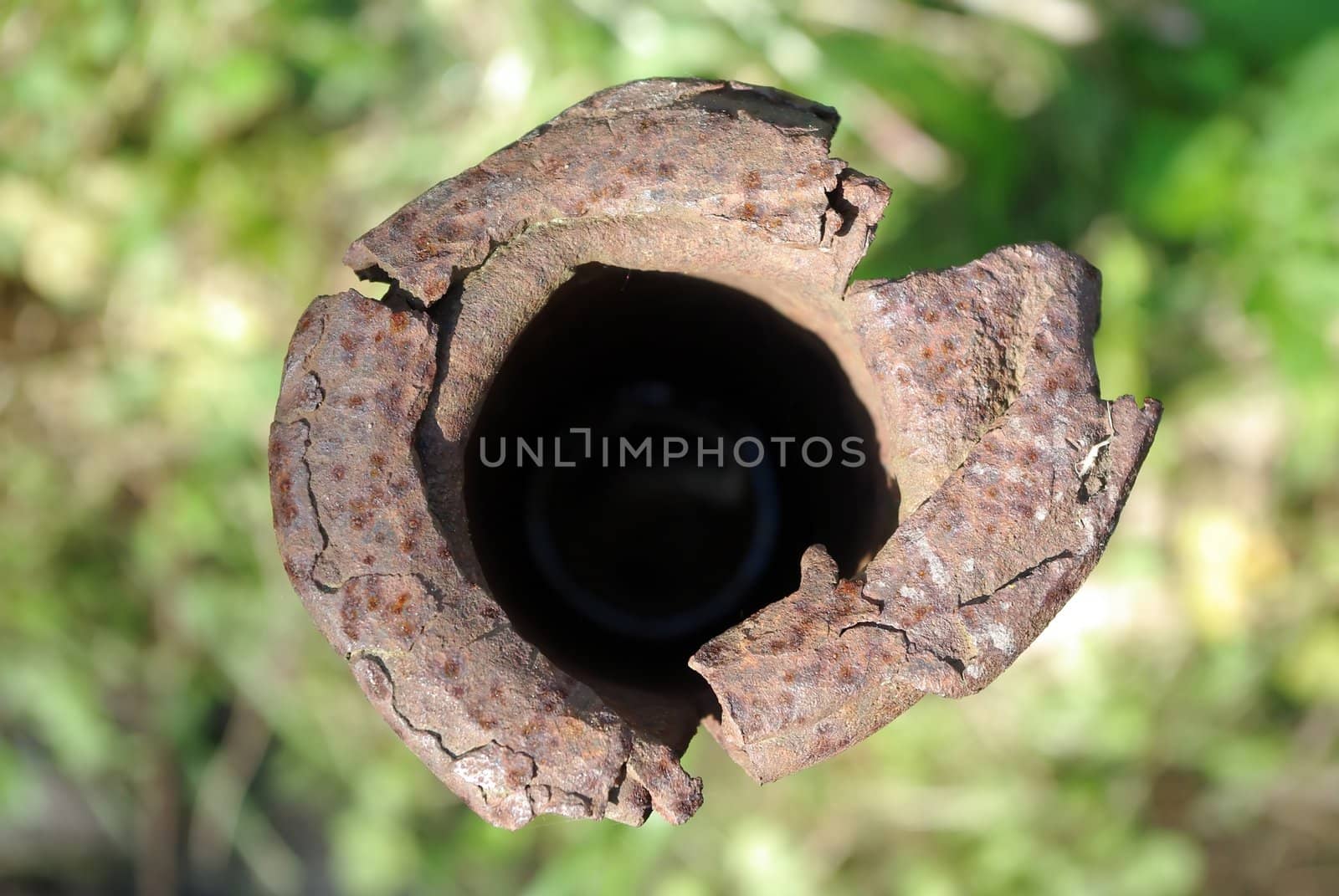 Rusty metal pipe by Vitamin