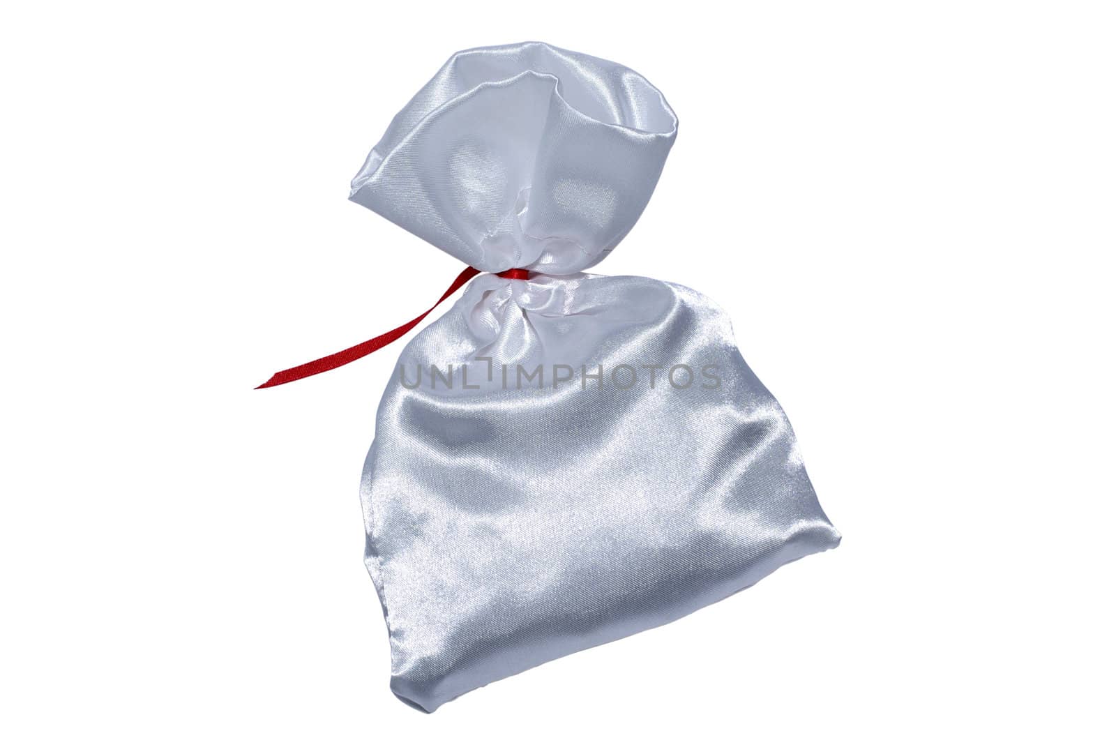 Silk bag with red ribbon. Isolated on white background. Clipping path.