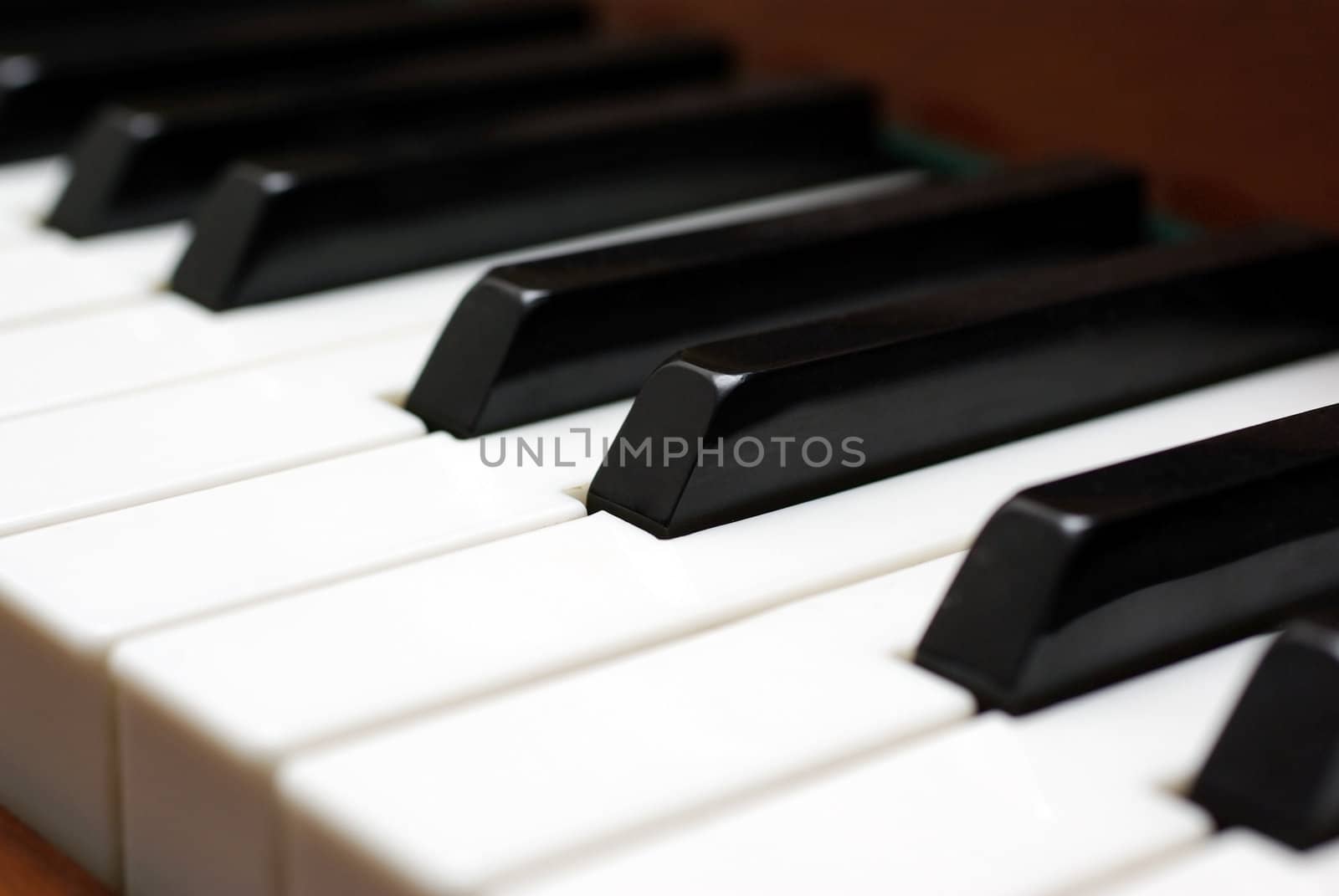 Piano keys close up photo. Selective focus. by borodaev