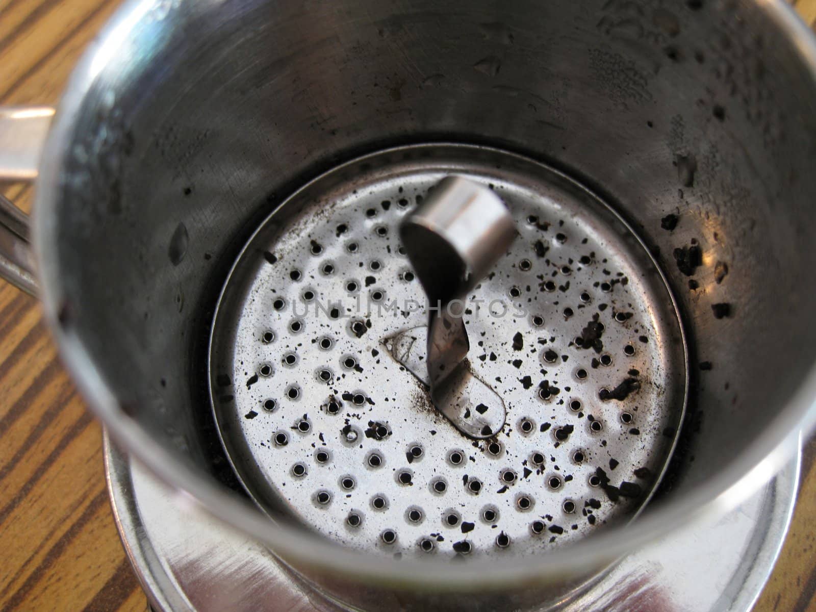 close-up for a vietnam style brewer with coffee grounds