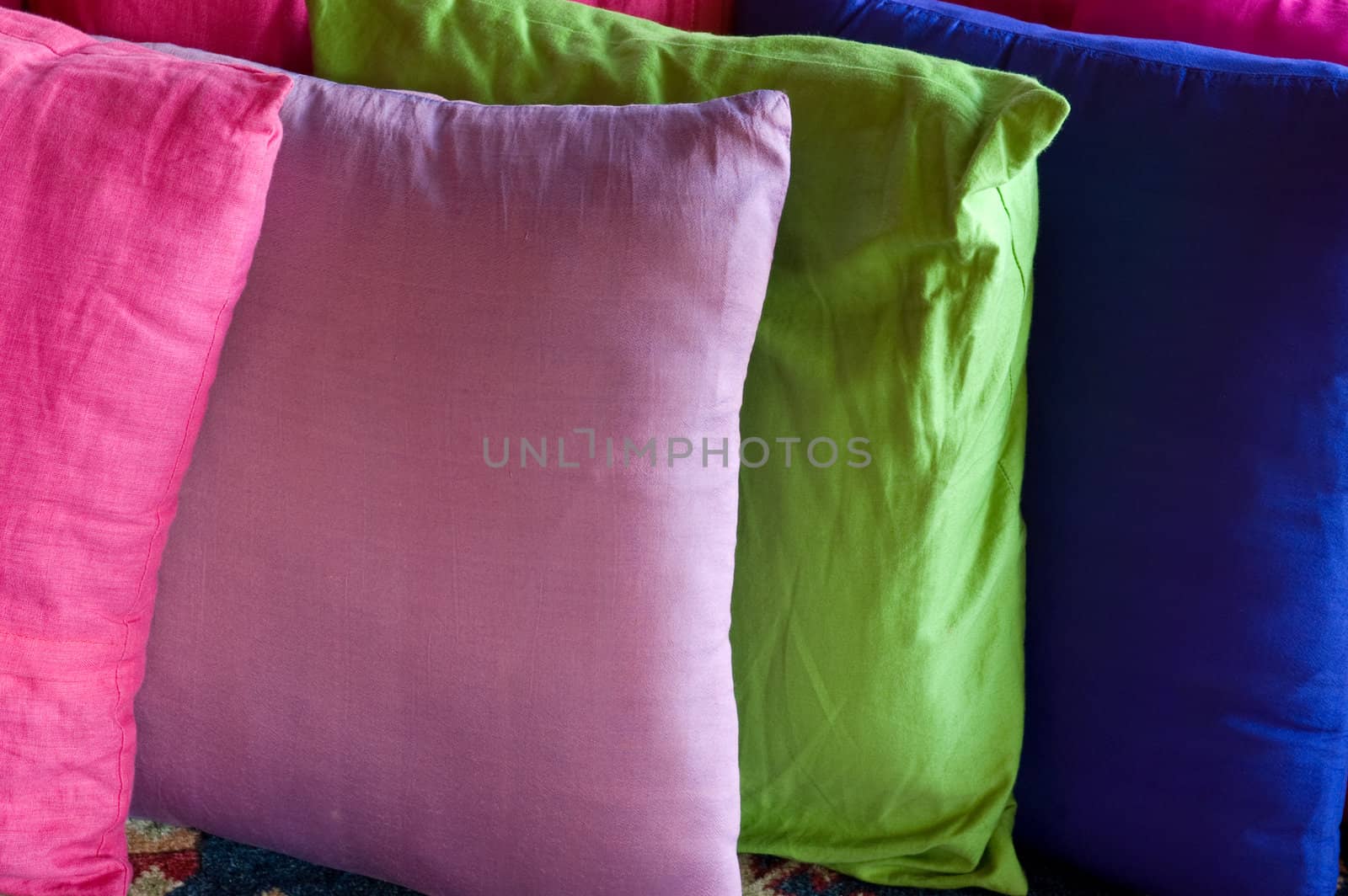 Close up of vividly colorful pillows