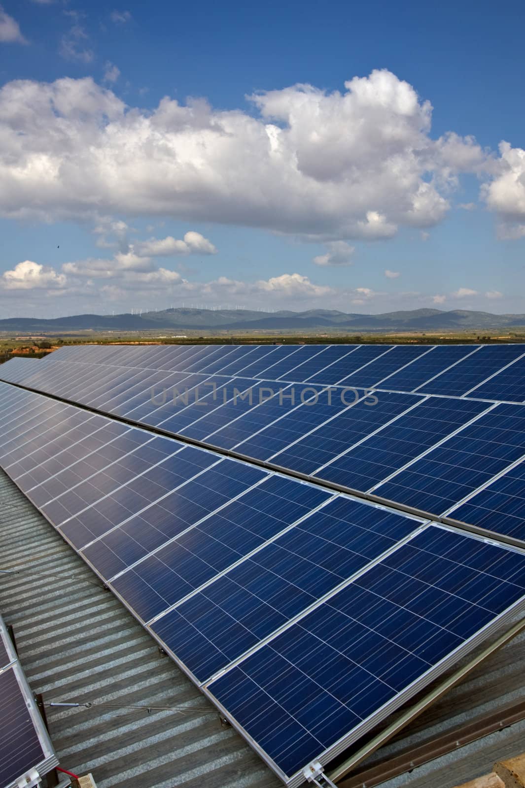 Solar Panel under Blue Sky and clouds.
Canon 40D. 17-55 mm