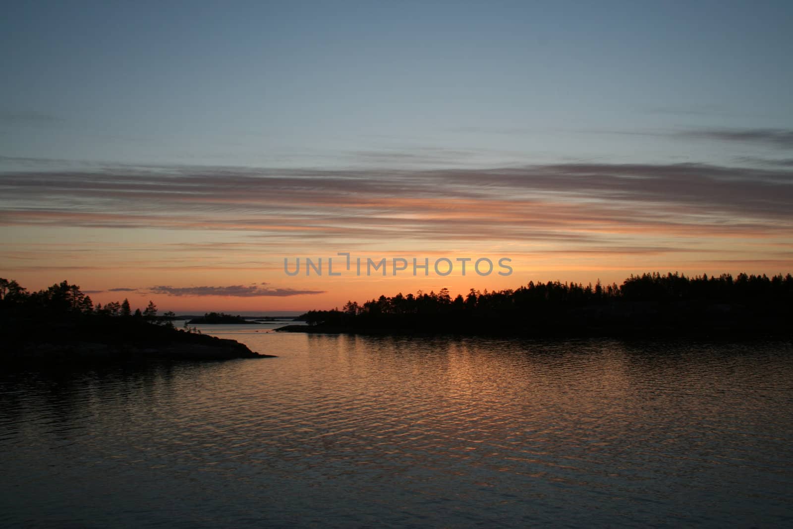 summer sunrise with cloudly sky and forest
