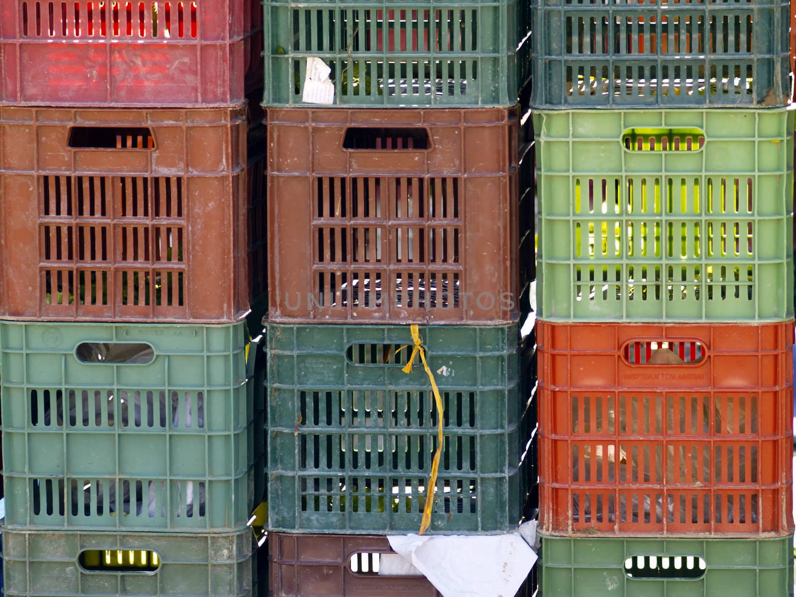 pile of plastic colored boxes