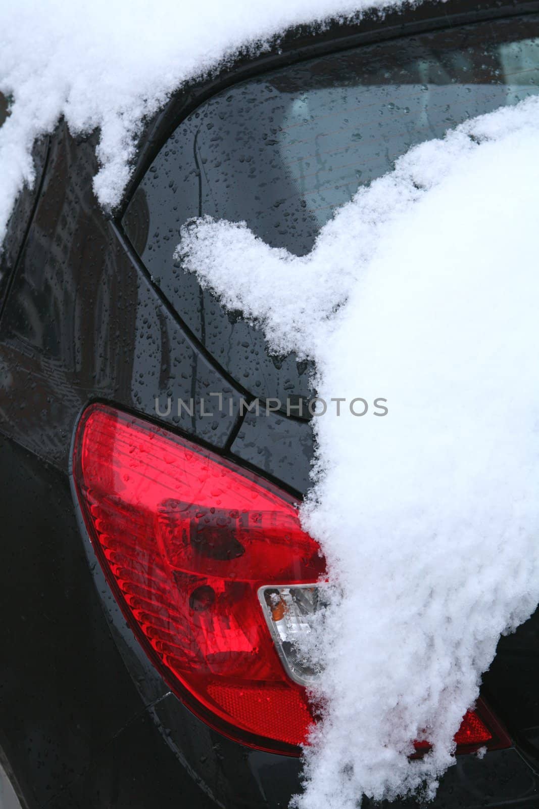 fragment of the car after big snowfall