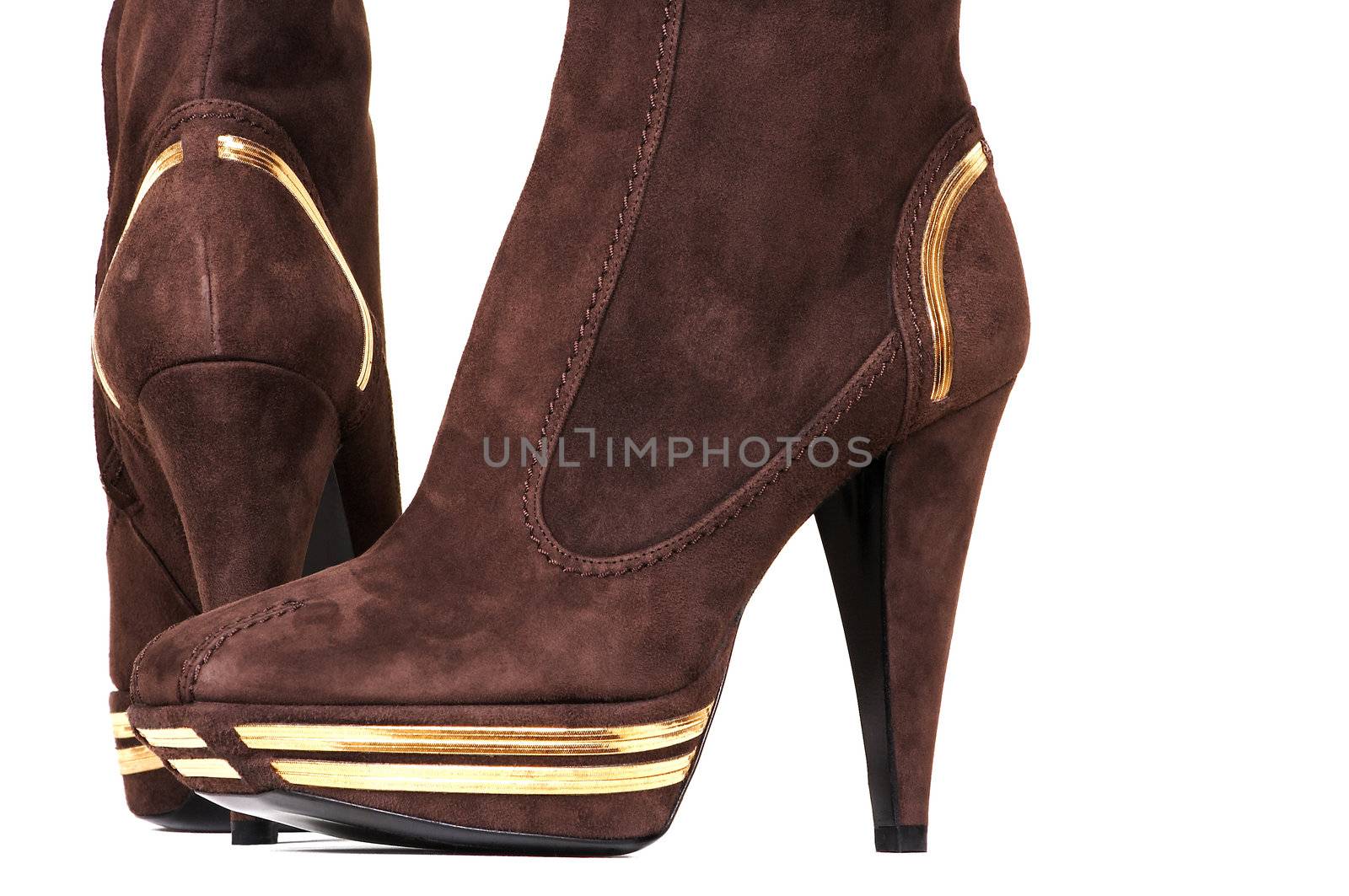 Fashionable female boots on a white background
