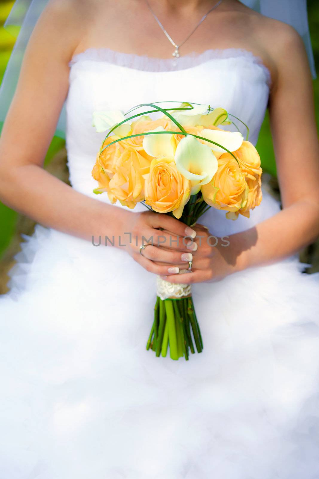 Bride holding a wedding bouquet