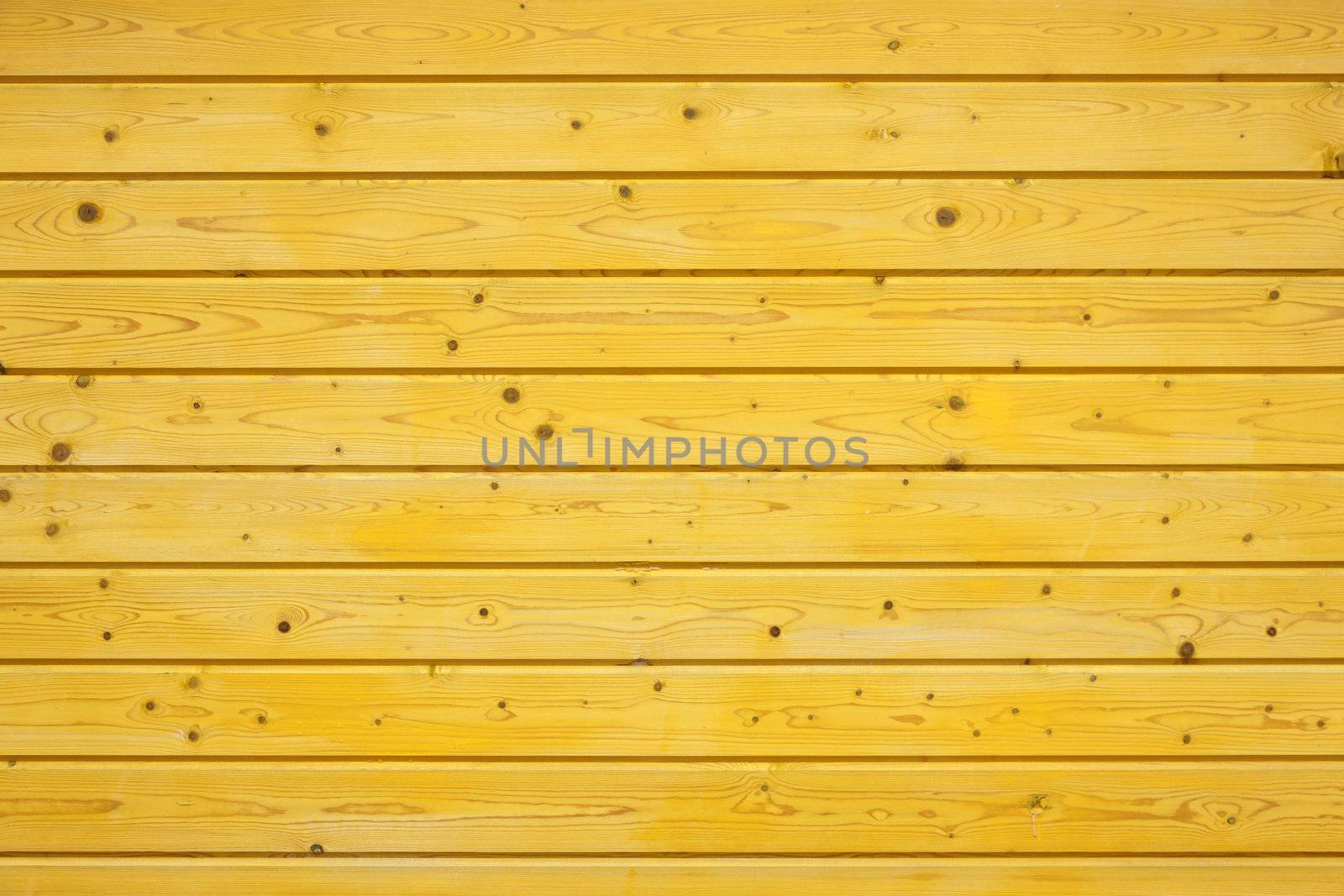 yellow wooden fence by ahavelaar