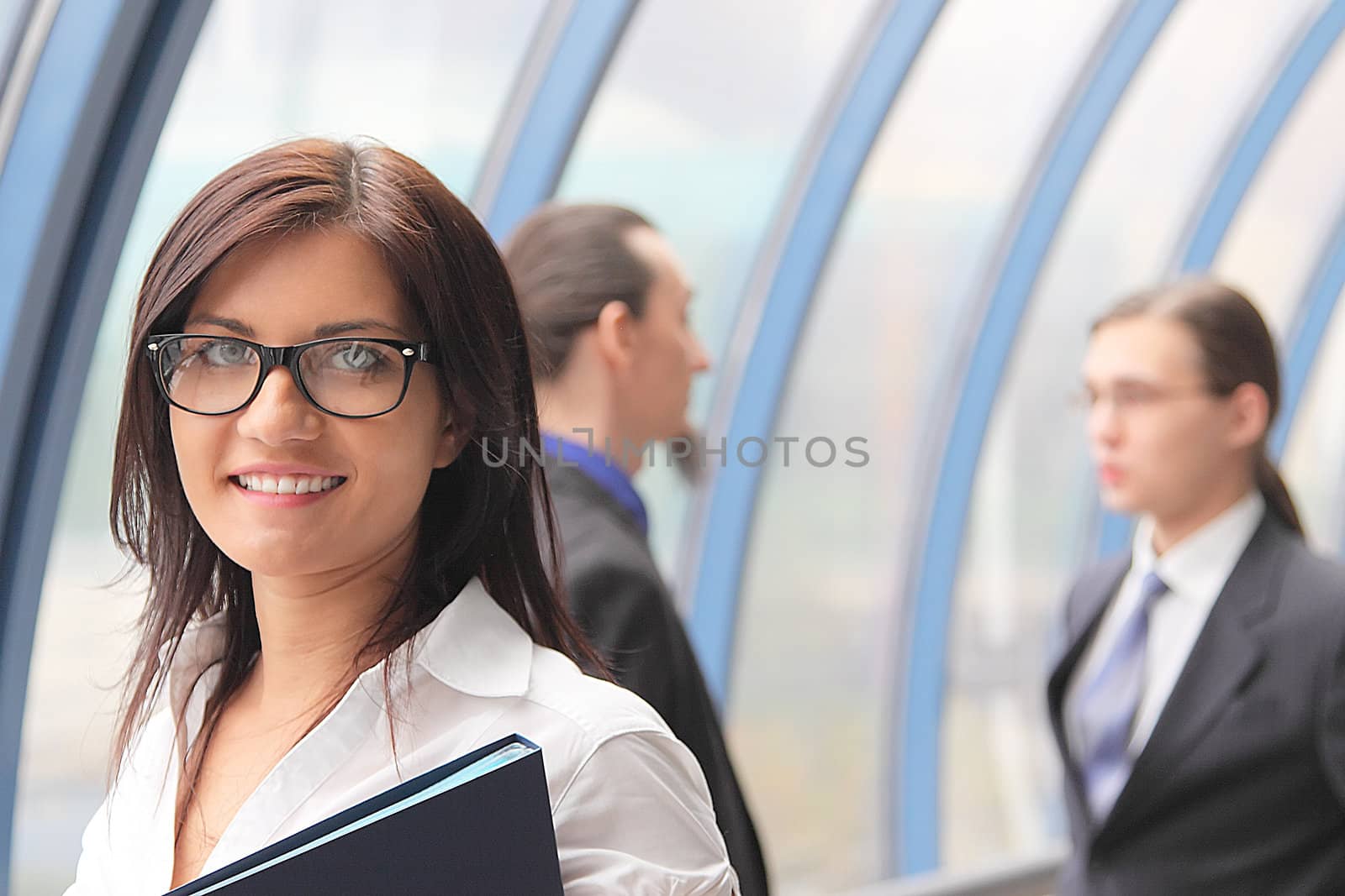 Portrait of the beautiful and young business woman