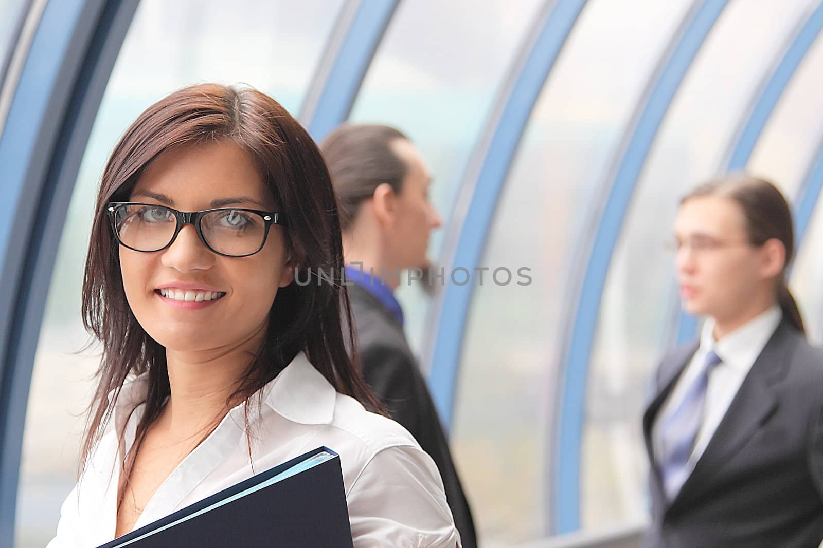 Portrait of the beautiful and young business woman
