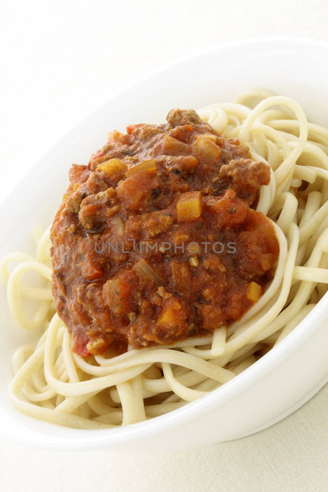Spaghetti Bolognese delicious classic pasta recipe, with fresh chunky and delicious pasta sauce with beef, pork, lots of vegetables and tons of flavor. 