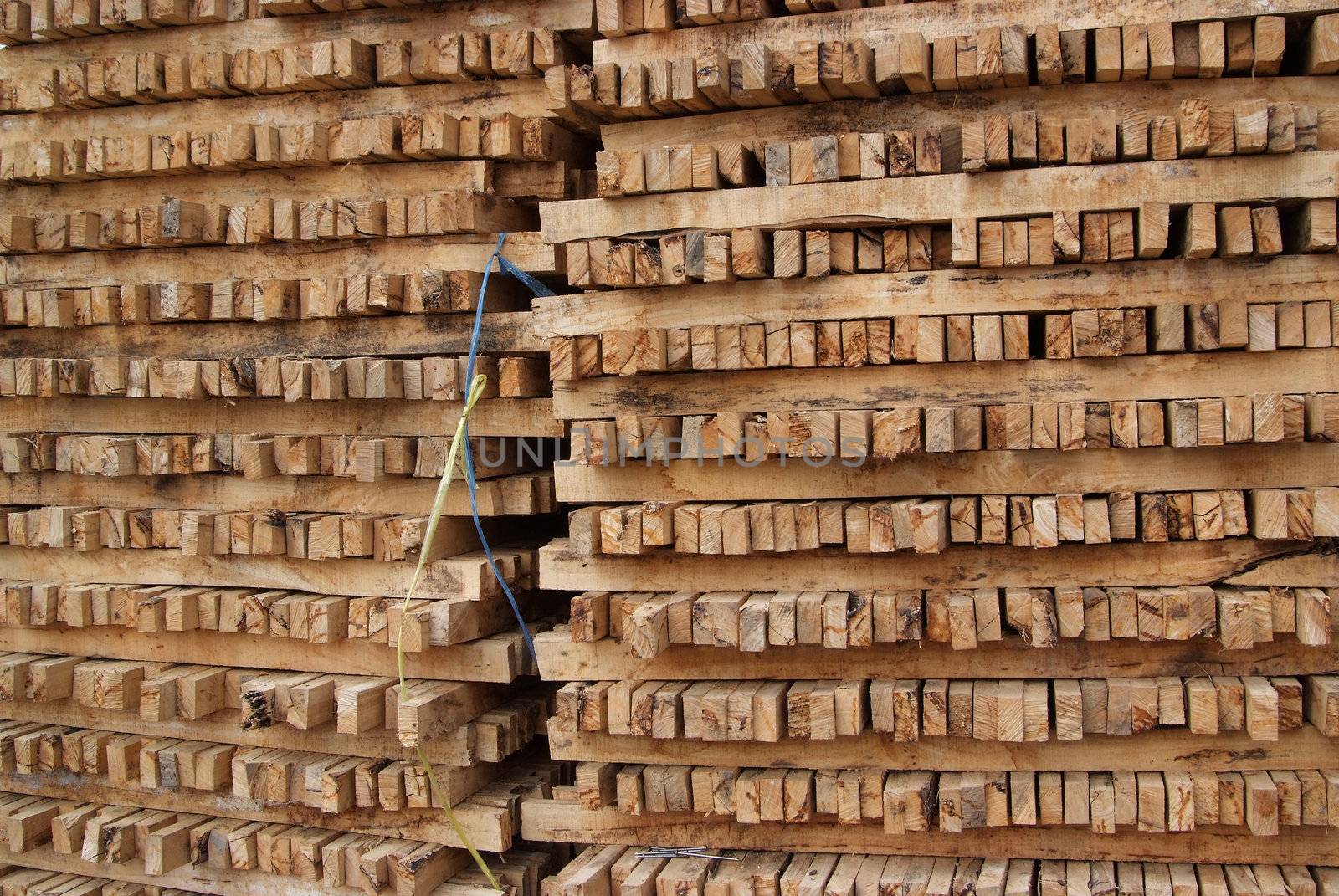 A pile of cut wood for construction ( texture, background, pattren)