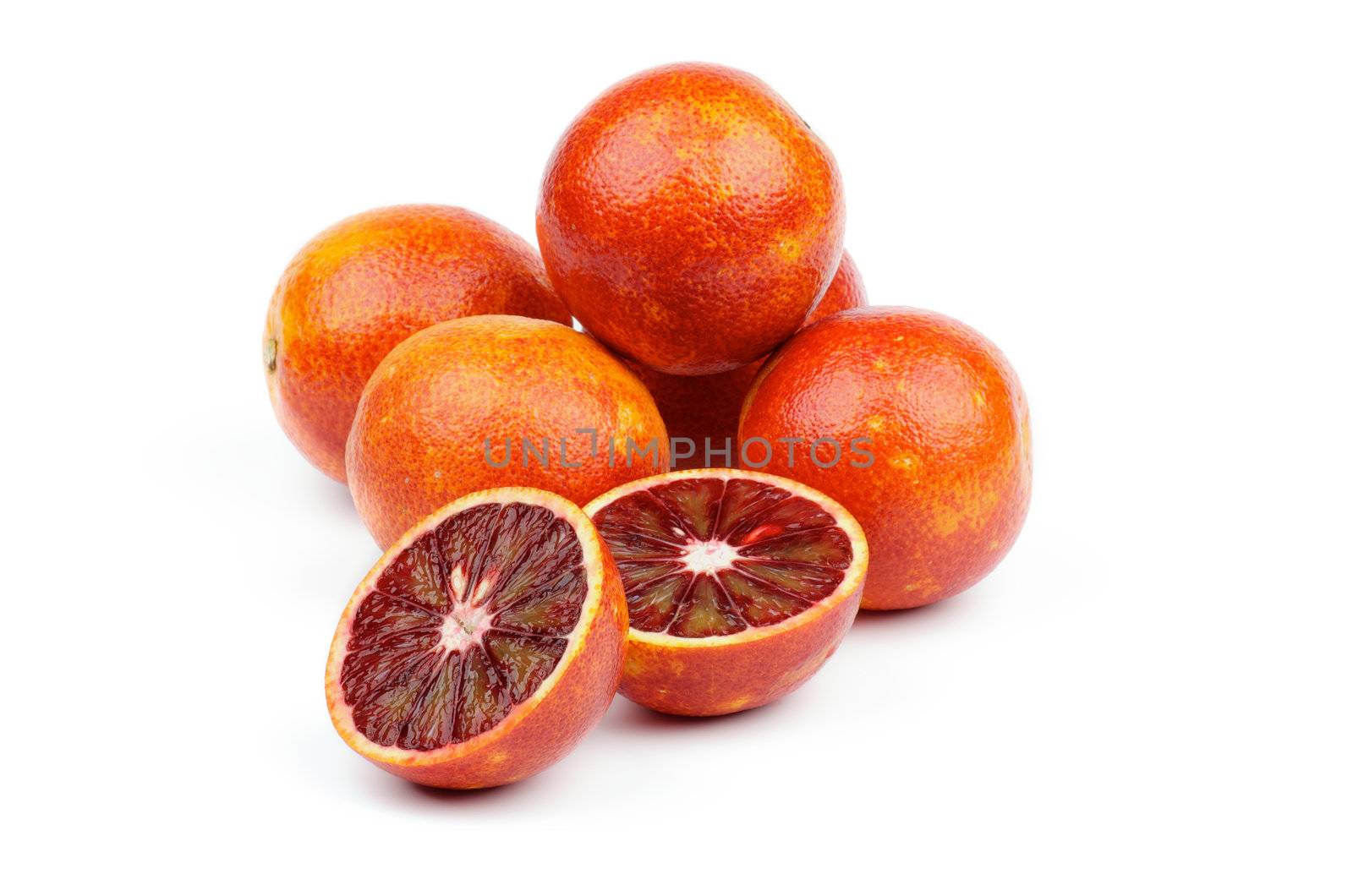 Heap of Perfect Blood Oranges Full Body and Half of isolated on white background