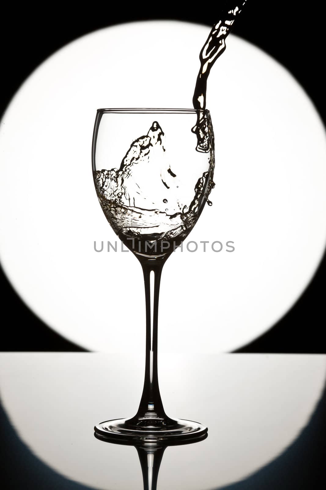food series: pouring white wine in the glass