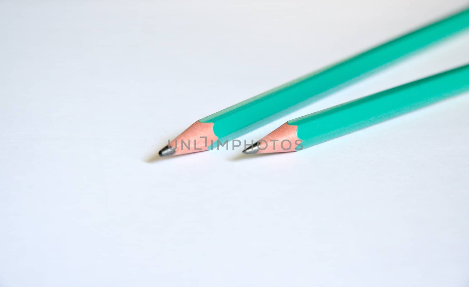 isolated two pencils on white close up