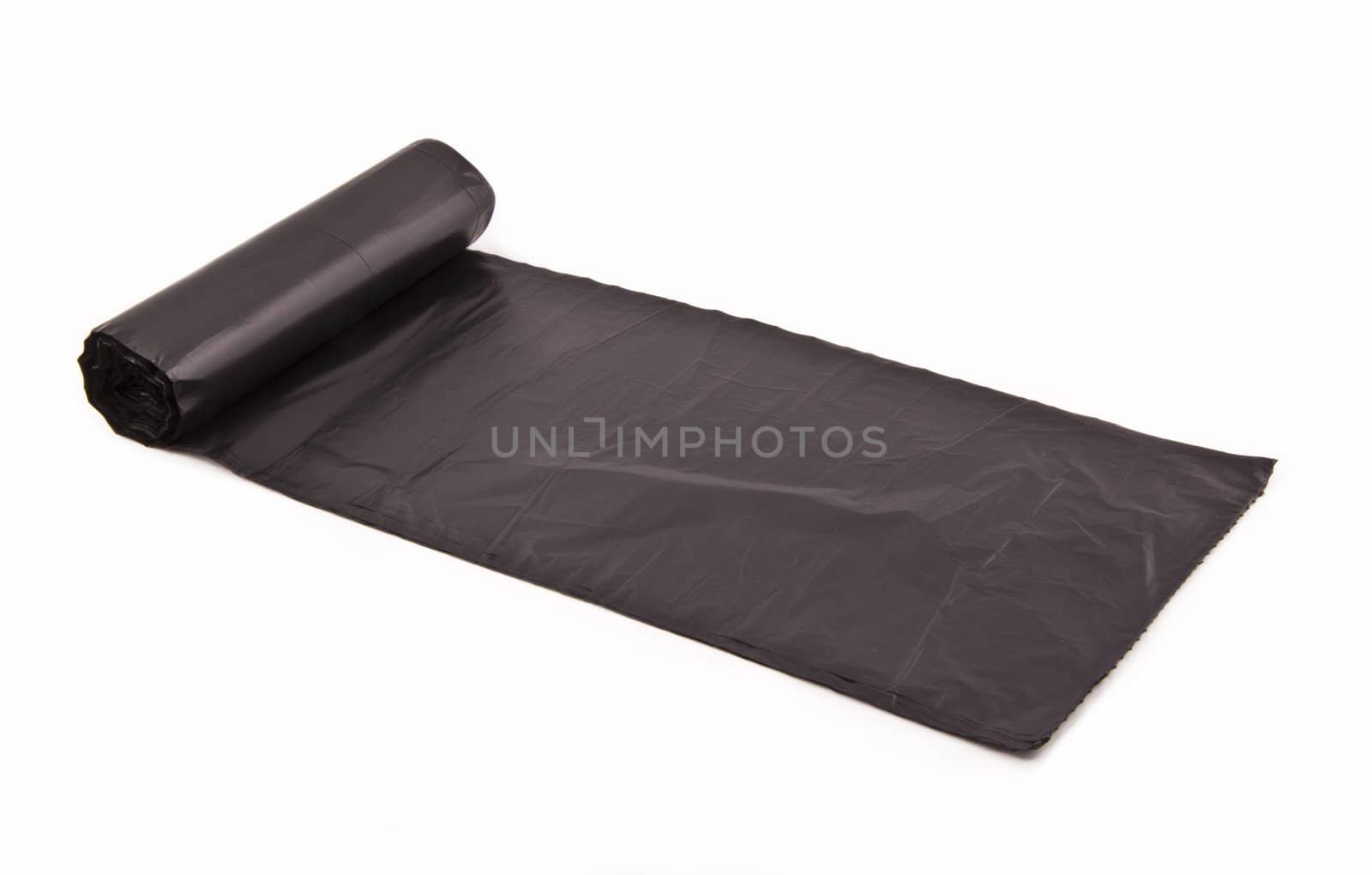Roll of plastic garbage bags isolated on white