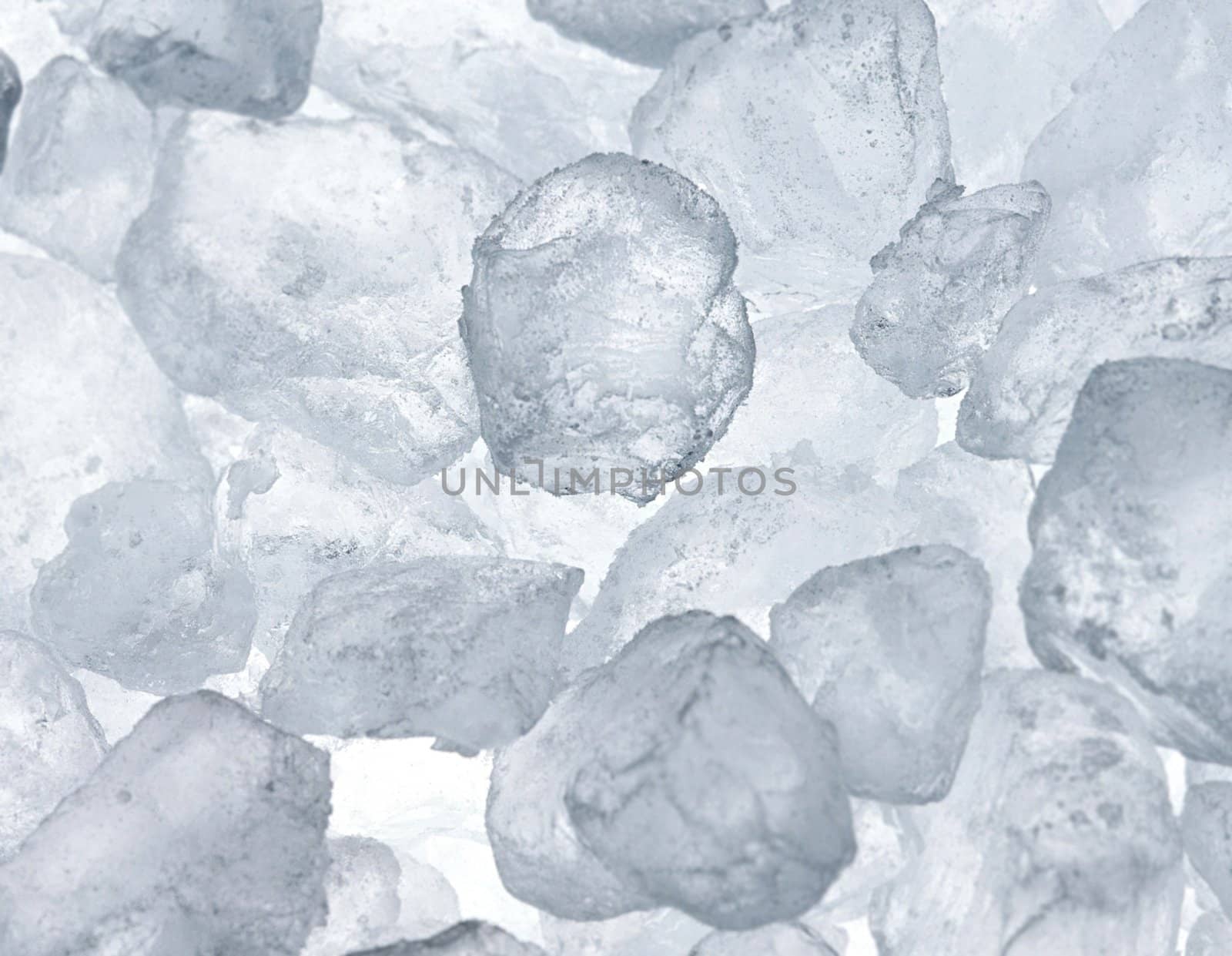 Background of blue ice cubes close up
