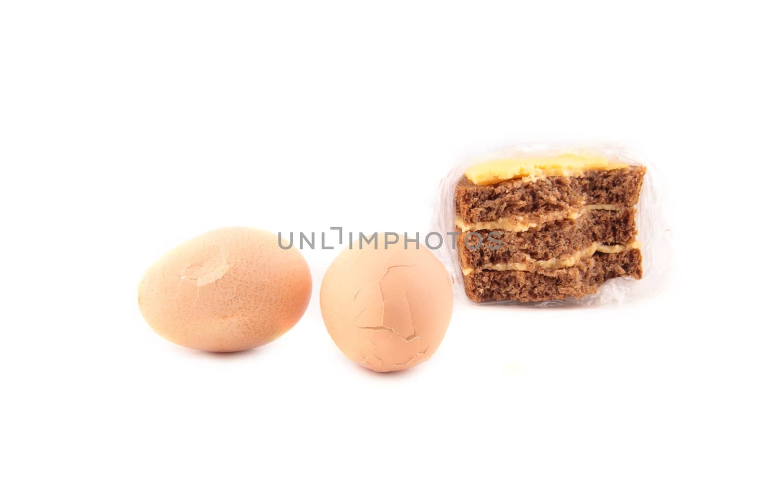 cracked eggs and sandwich