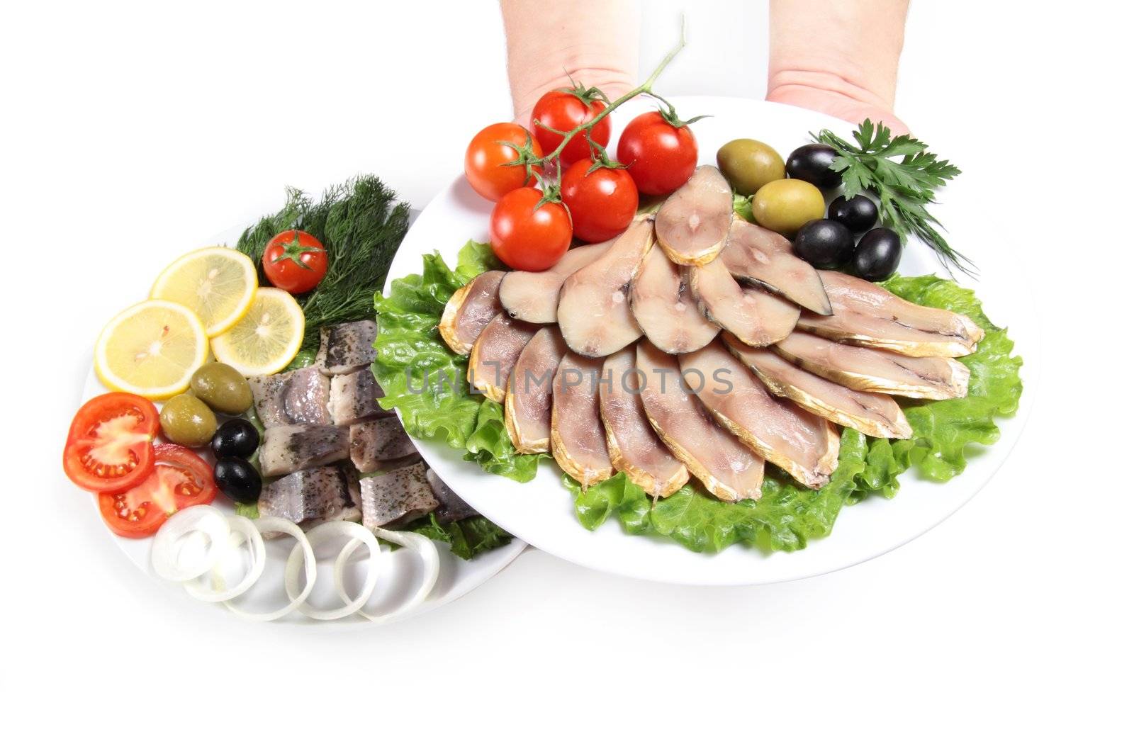 human hand with plate and slices fish