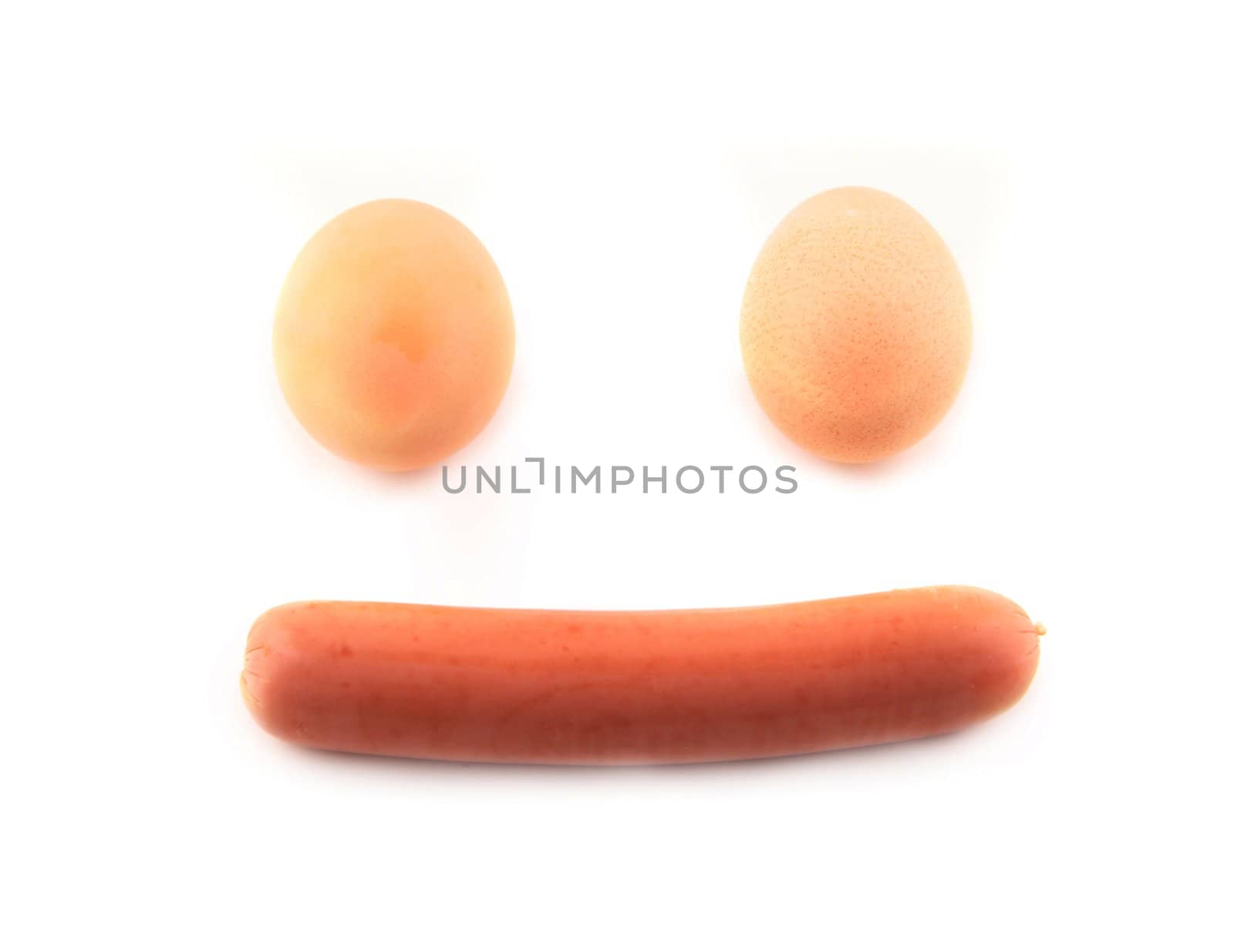 Sausage and eggs in happy breakfast