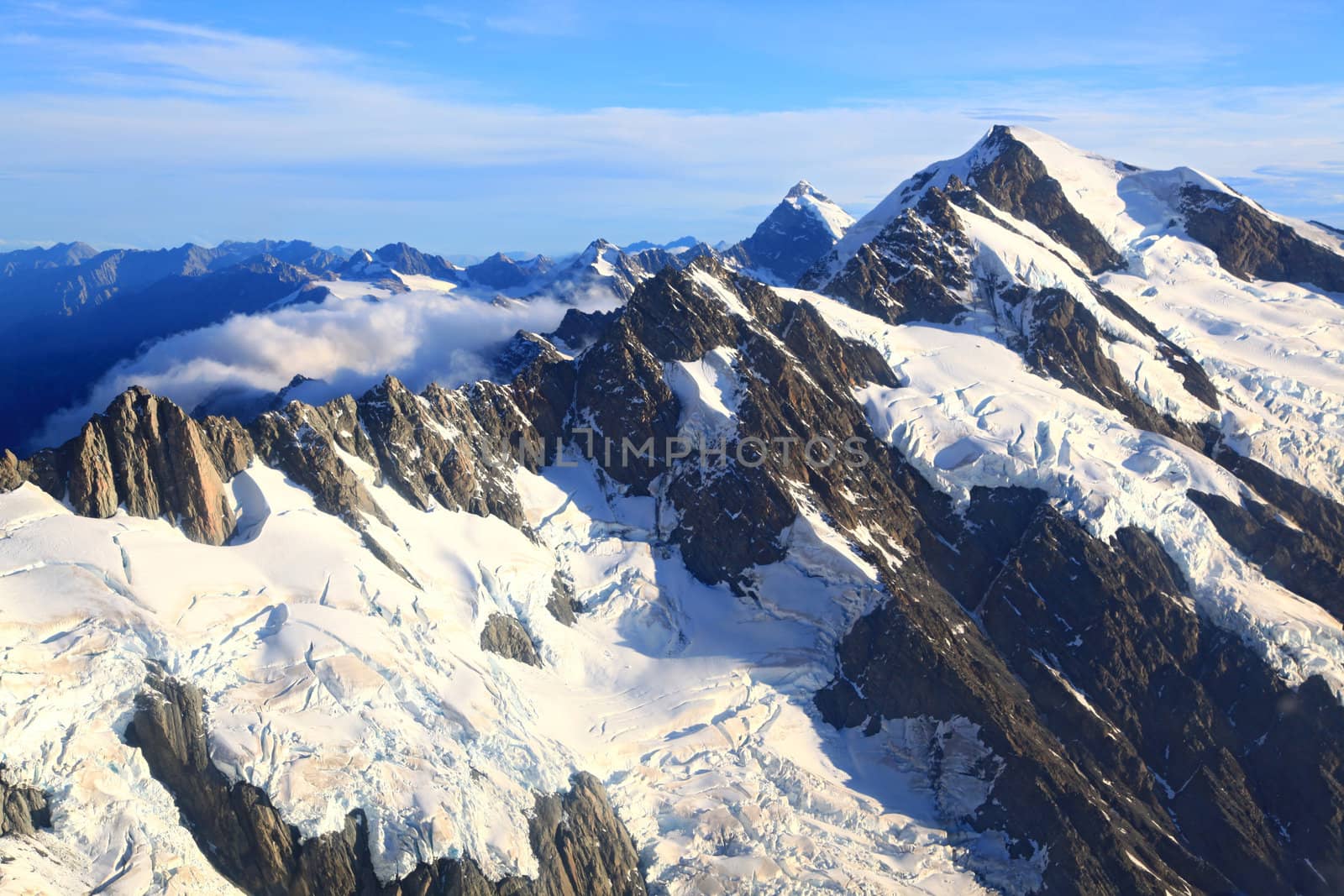 aerial view of Mountain Cook Peak with mist from Helicopter, New Zealand