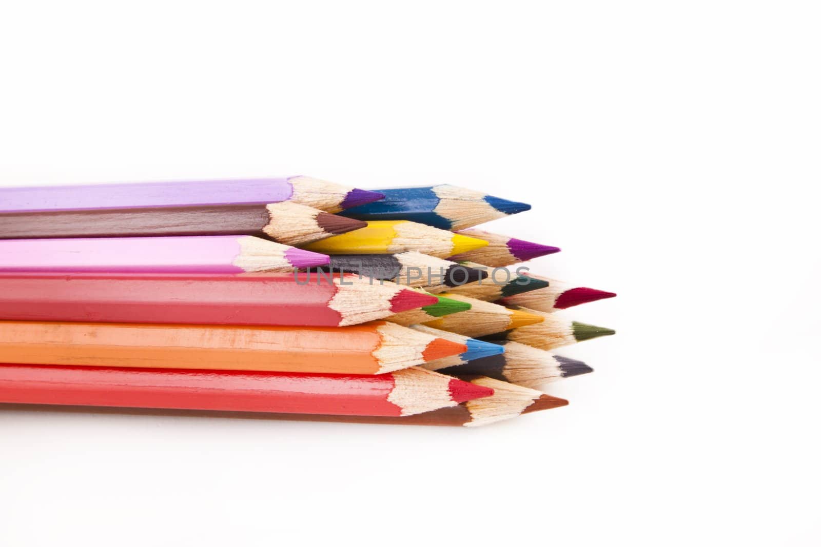 Colour pencils isolated on white background close up