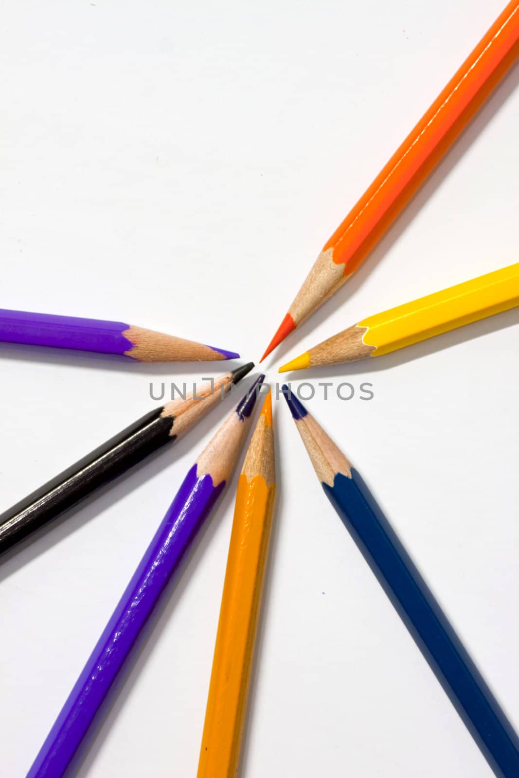 Colour pencils on white background