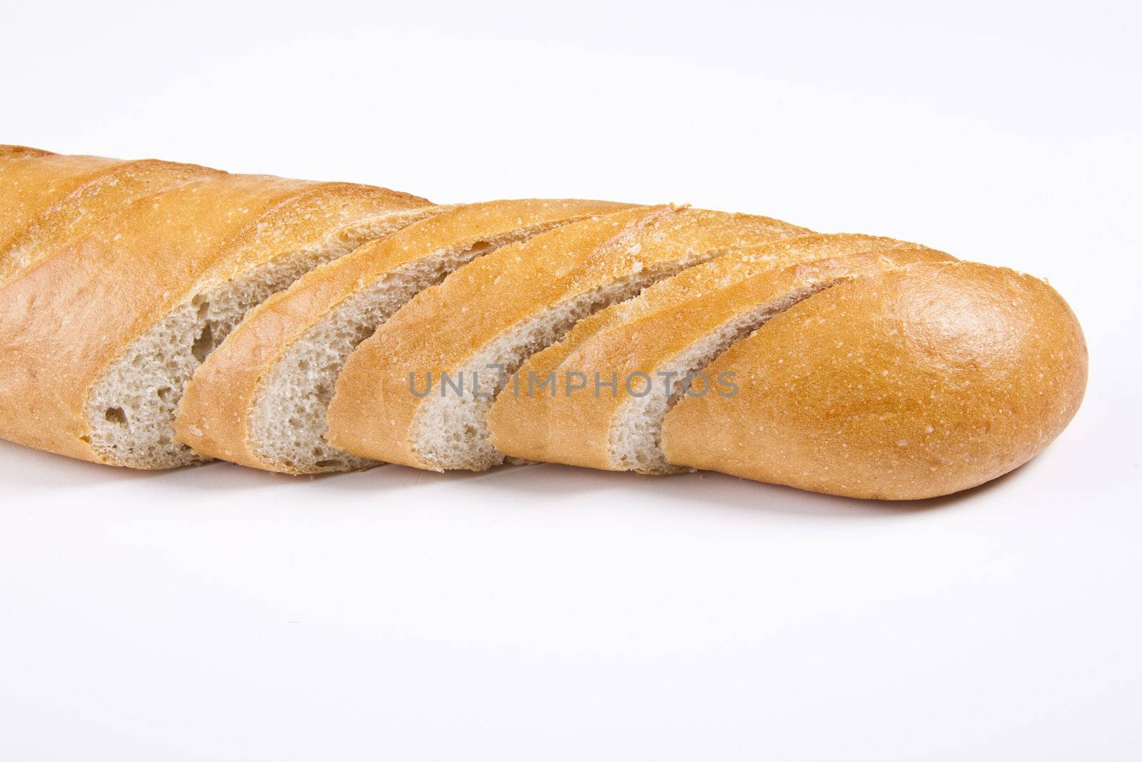 Fresh baguette, sliced isolated