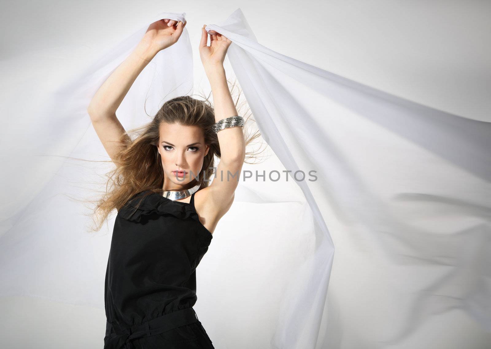 Beautiful girl with a white sheet by robert_przybysz