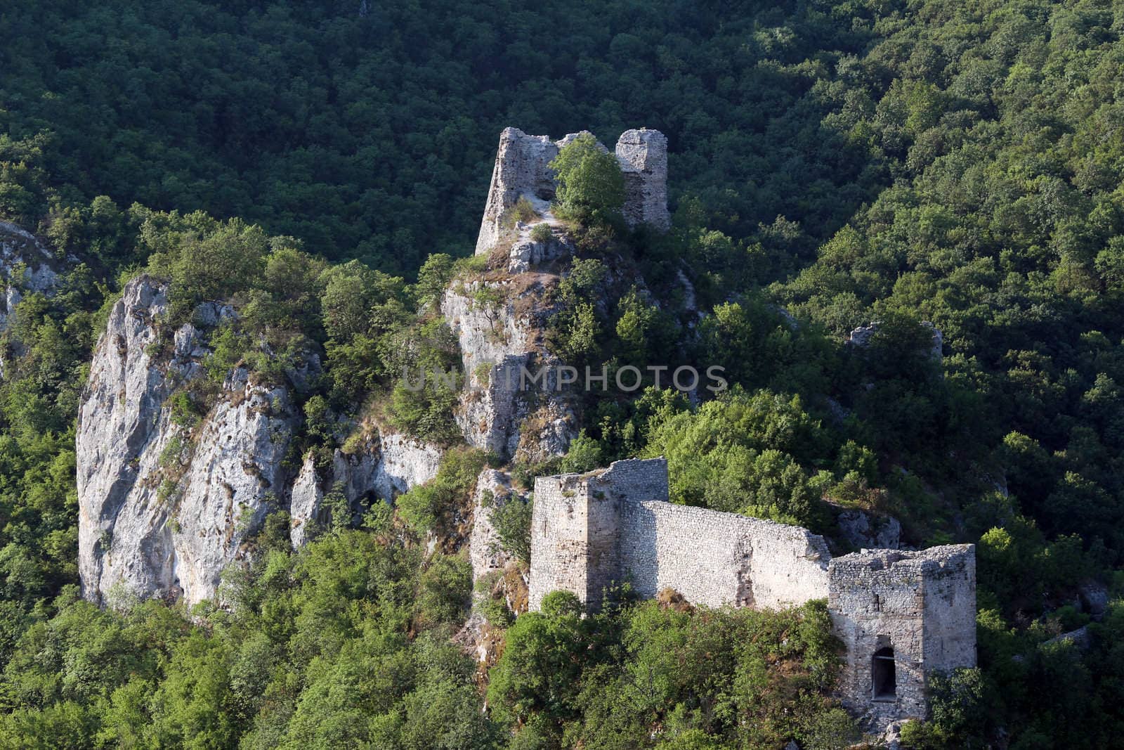 old ruined fortress on mountain landscape