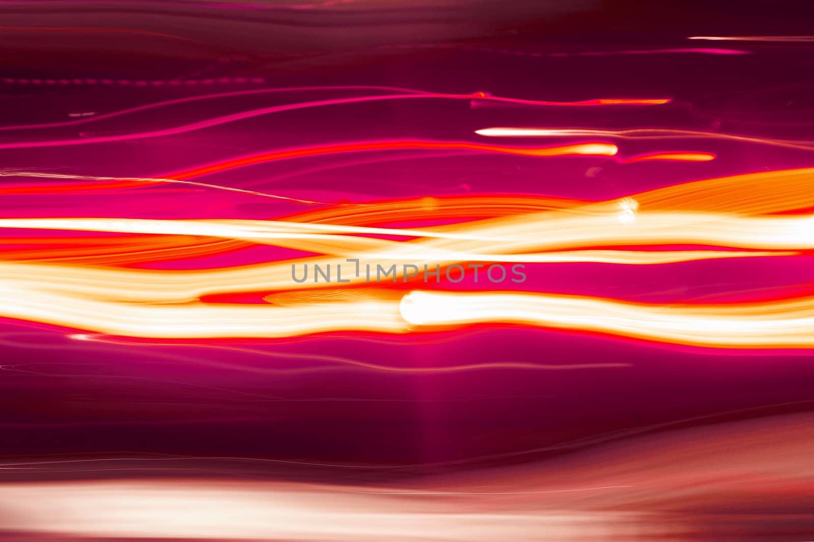 Moving textural, red lights on black background