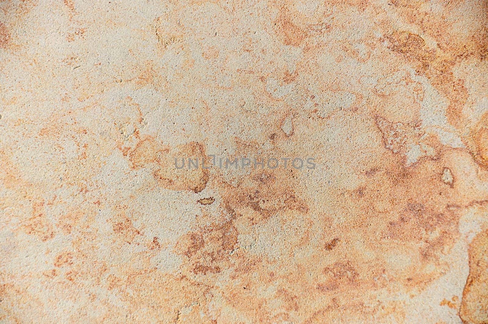 Background - texture of stone, a beautiful abstract pattern in beige and golden tones