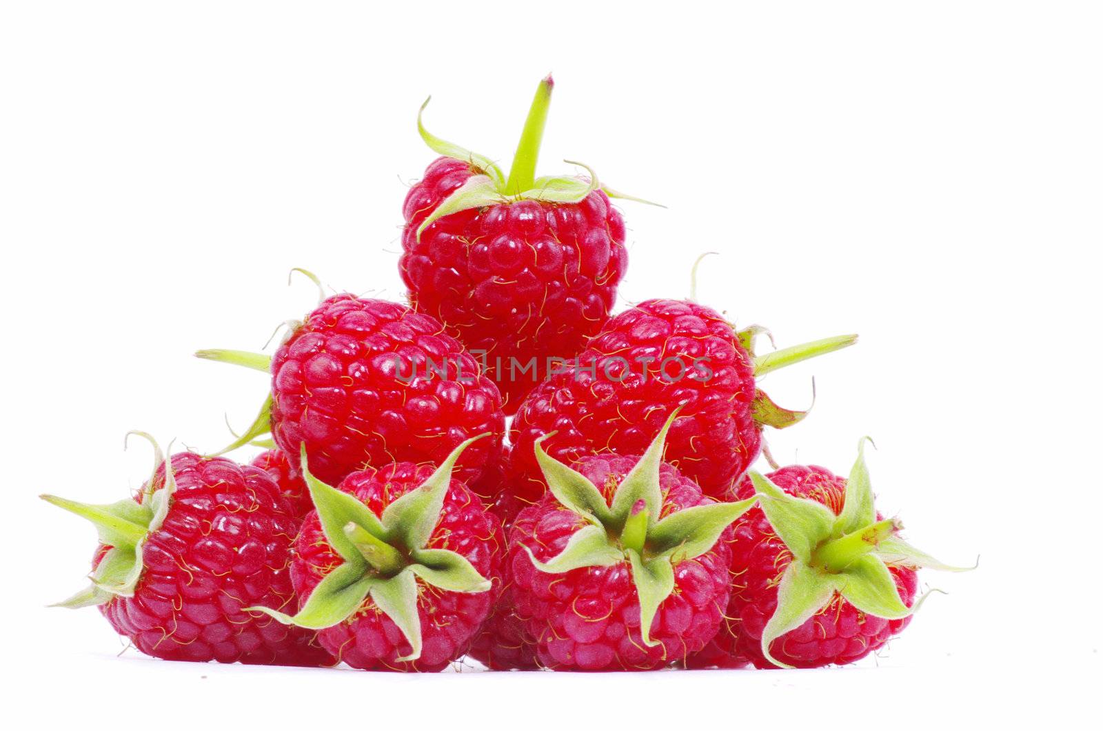 Ripe raspberry isolated on a white background
