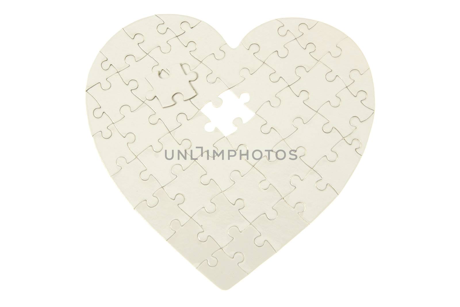 heart made from the puzzle on white
