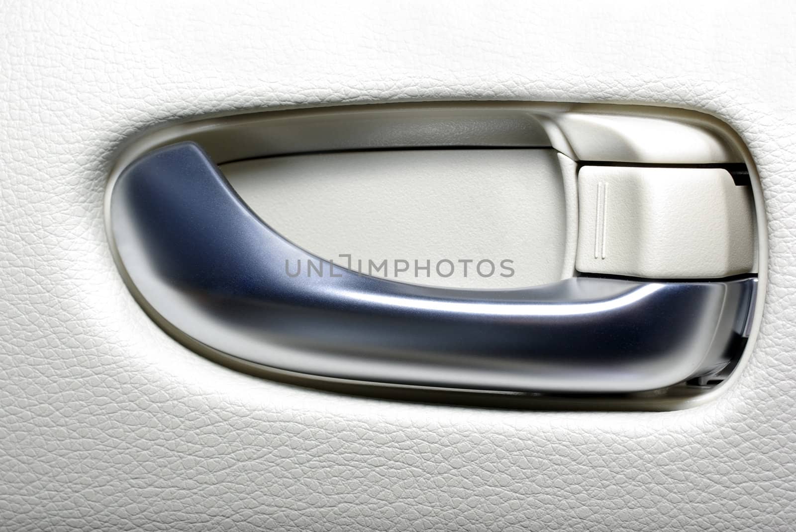 Aluminium door handle of modern japanese car. Abstract backgroun by borodaev