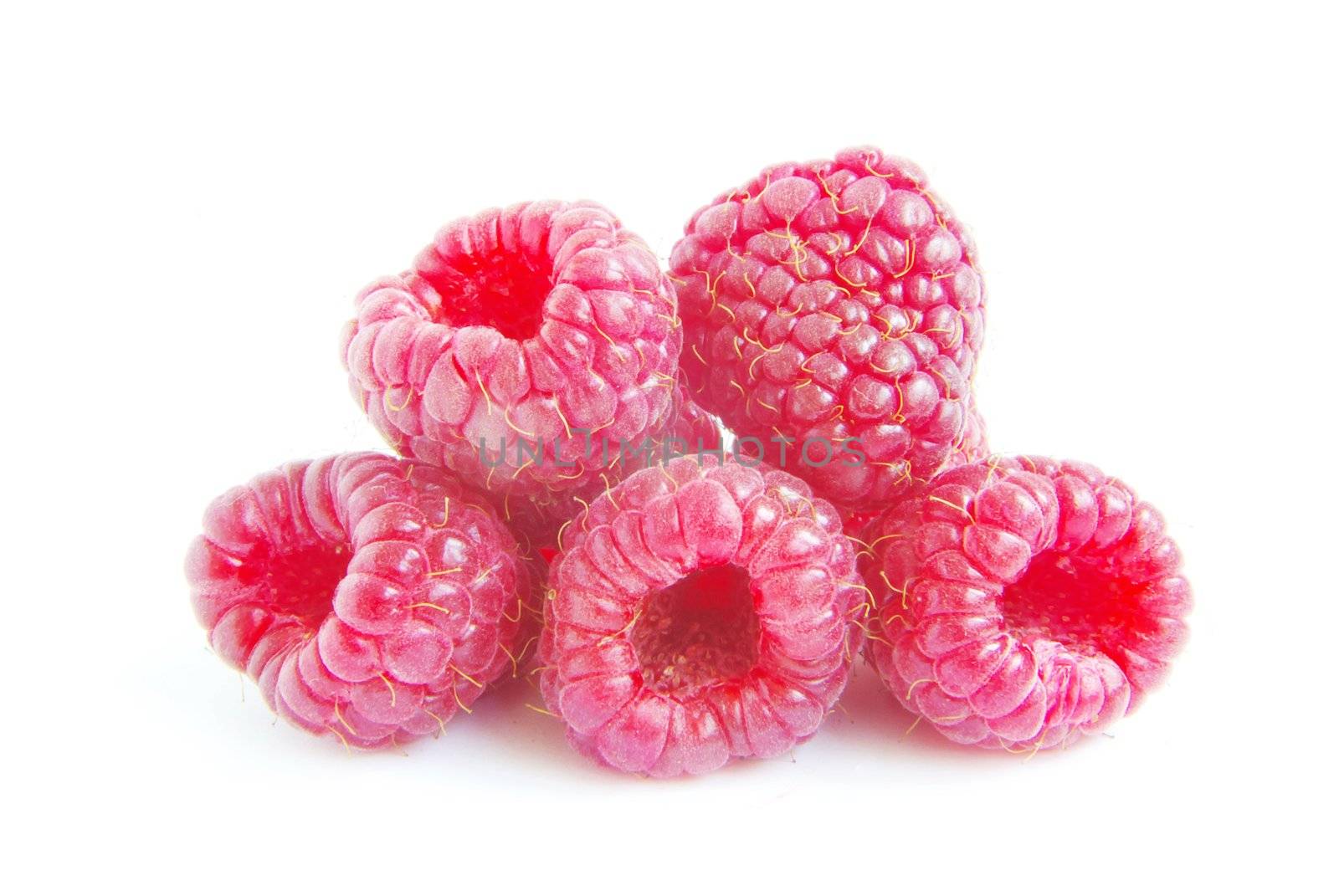 Ripe raspberry on a white background